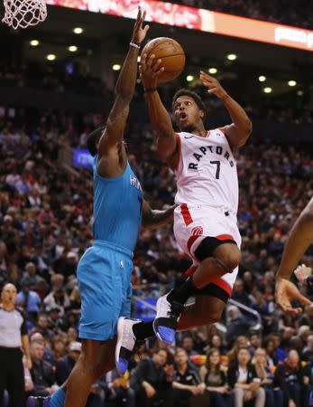 Mar 24, 2019; Toronto, Ontario, CAN; Toronto Raptors guard Kyle Lowry (7) shoots against Charlotte Hornets guard Dwayne Bacon (7) at Scotiabank Arena. Charlotte defeated Toronto. Mandatory Credit: John E. Sokolowski-USA TODAY Sports