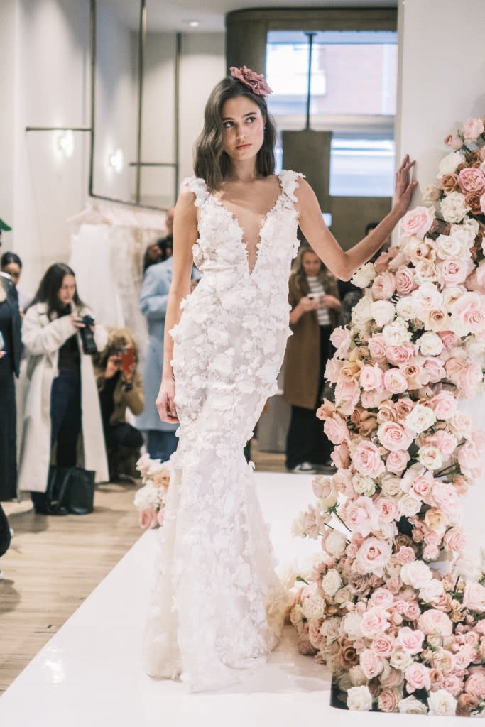 “Each gown celebrates the beauty of growth, romance and the timeless elegance that transcends through generations,” Lahav told The Post of the Spring 2025 collection. Stephen Yang