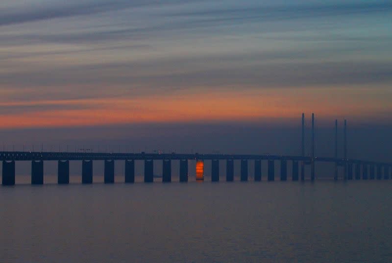 FILE PHOTO: Vehicles travel along the Oresund Bridge