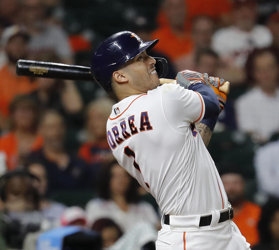 HOUSTON, TEXAS - JUNE 17: Carlos Correa #1 of the Houston Astros pops out against the Chicago White Sox at Minute Maid Park on June 17, 2021 in Houston, Texas. (Photo by Bob Levey/Getty Images)