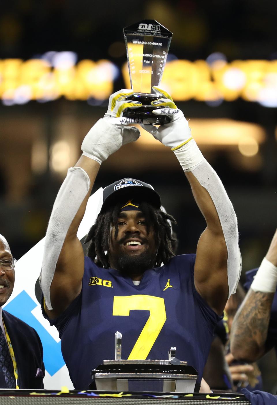 Michigan Wolverines running back Donovan Edwards (7) voted MVP celebrates the 43-22 win against the Purdue Boilermakers in the Big Ten championship game at Lucas Oil Stadium in Indianapolis on Saturday, Dec. 3, 2022.