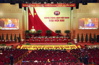 Delegates attend the opening of 13th Communist Party Congress in Hanoi, Vietnam on Tuesday, Jan. 26, 2021. Vietnam's ruling Communist Party has begun a crucial weeklong meeting in the capital Hanoi to set the nation's path for the next five years and appoint the country's top leaders. (An Van Dang/VNA via AP)