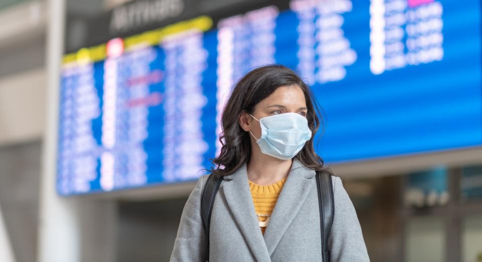 Face masks are mandatory during all stages of taking a flight (Getty)