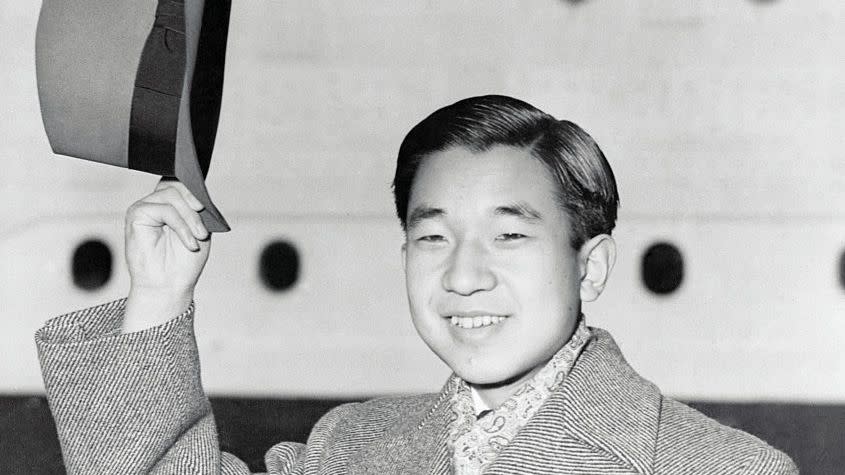 prince akihito doffing his hat