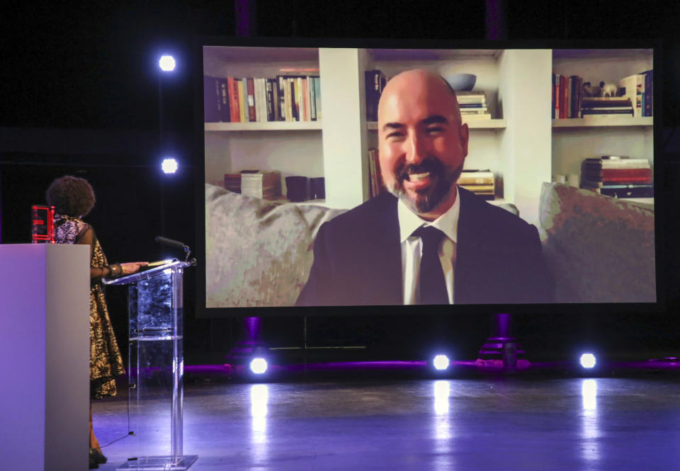 FILE - In this Thursday, Nov. 19, 2020 file photo, Douglas Stuart speaks at The 2020 Booker Prize Awards Ceremony, at the Roundhouse in London. Fittingly in this year of work-from-home and lockdowns, Douglas Stuart’s life-changing moment came to him on his sofa. The Scottish writer was at home on Manhattan’s Lower East Side when he was announced as the winner of the 2020 Booker Prize last week. (David Parry/PA via AP, File)