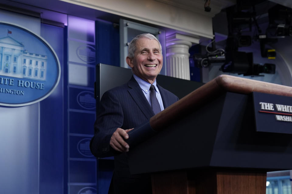 Dr. Anthony Fauci, director of the National Institute of Allergy and Infectious Diseases, laughs while speaking in the James Brady Press Briefing Room at the White House, Thursday, Jan. 21, 2021, in Washington. (AP Photo/Alex Brandon)