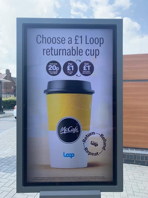 This photos provided by North America Public Relations shows an ad for a reusable cup at McDonald's restaurant. Reusable packaging is about to become more common at groceries and restaurants worldwide. Loop, which collects and sanitizes reusable containers, said Wednesday, Sept. 22, 2021 it’s expanding after successful trials in France and Japan. Kroger and Walgreens in the U.S., and Tesco in the United Kingdom are among the groceries partnering with Loop. McDonald’s, Burger King and Tim Hortons have also signed on. (North America Public Relations via AP)