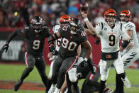 Cincinnati Bengals quarterback Joe Burrow (9) throws a pass against the Tampa Bay Buccaneers during the second half of an NFL football game, Sunday, Dec. 18, 2022, in Tampa, Fla. (AP Photo/Chris O'Meara)