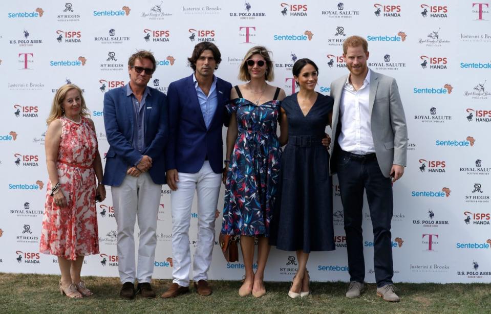 Meghan, Duchess of Sussex, second right, Prince Harry, Delfina Blaquier, third right, and her husband Argentine polo player Nacho Figueras, third left (AP)