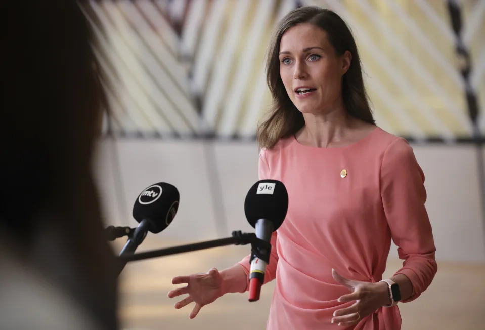 FILE - Finland's Prime Minister Sanna Marin speaks with the media as she arrives for an EU summit in Brussels, Thursday, June 23, 2022. Finland’s prime minister is ruling out taking any drugs during a party in a private home with some friends, after a video showing six people dancing in front of camera, including Finnish Prime Minister Sanna Marin, was leaked. "I’m disappointed that they’ve become public. I spent the evening with friends. Partied, pretty wild, yes. Danced and sang", she was quoted as saying by Finnish broadcaster YLE on Thursday, Aug. 18, 2022. (AP Photo/Olivier Matthys, File)