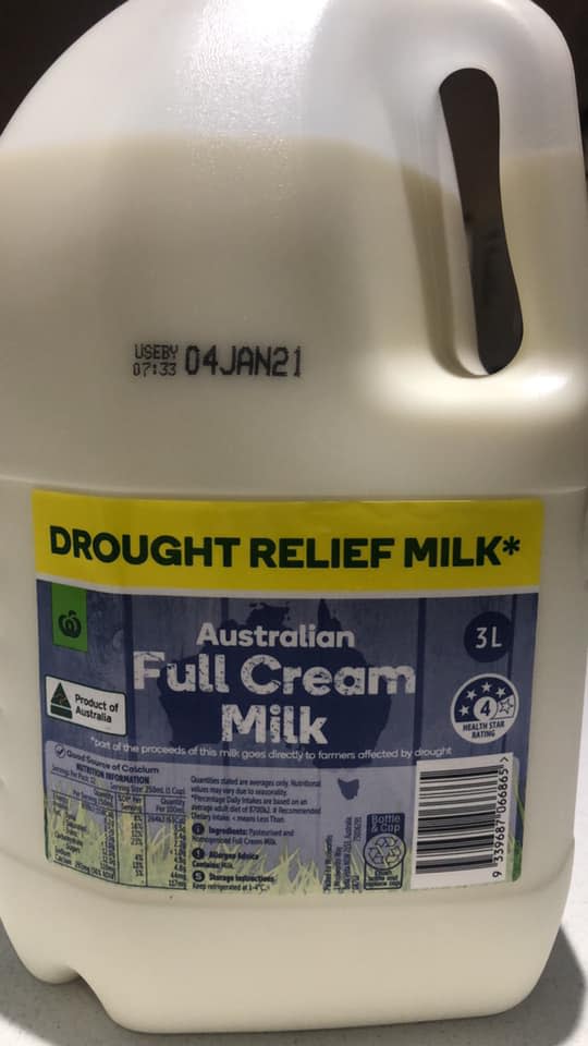 A four-litre carton of Woolworths milk is pictured.