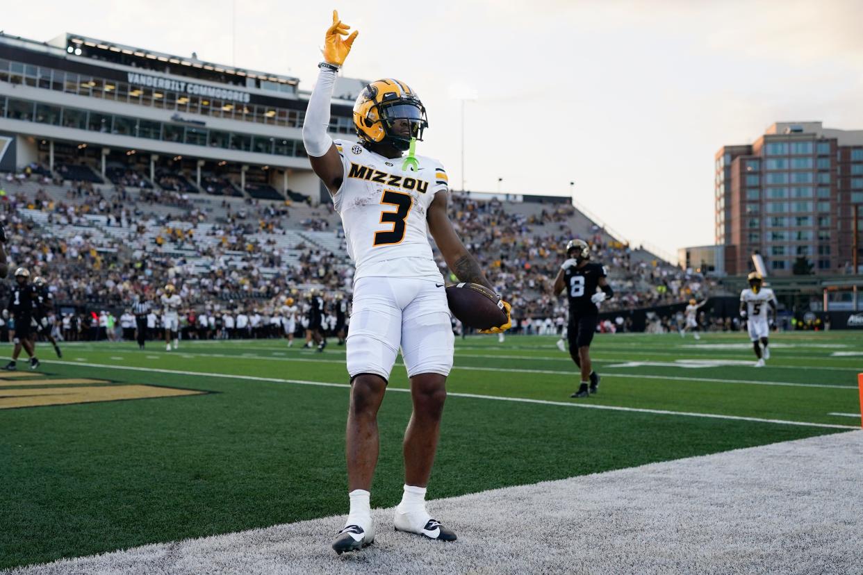 Missouri wide receiver Luther Burden III (3) celebrates a touchdown against Vanderbilt in the second half of an NCAA college football game Saturday, Sept. 30, 2023, in Nashville, Tenn. (AP Photo/George Walker IV)