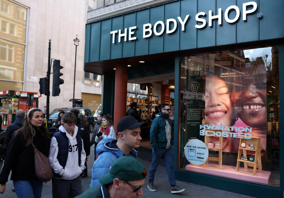 Pedestrians walk past a branch of The Body Shop in central London on February 12, 2024. The Body Shop, the nearly 50-year-old cosmetics company known for its ethical hair and skincare products, is on the verge of bankruptcy in the UK after a poor Christmas season, British media reports. (Photo by Daniel LEAL / AFP) (Photo by DANIEL LEAL/AFP via Getty Images)