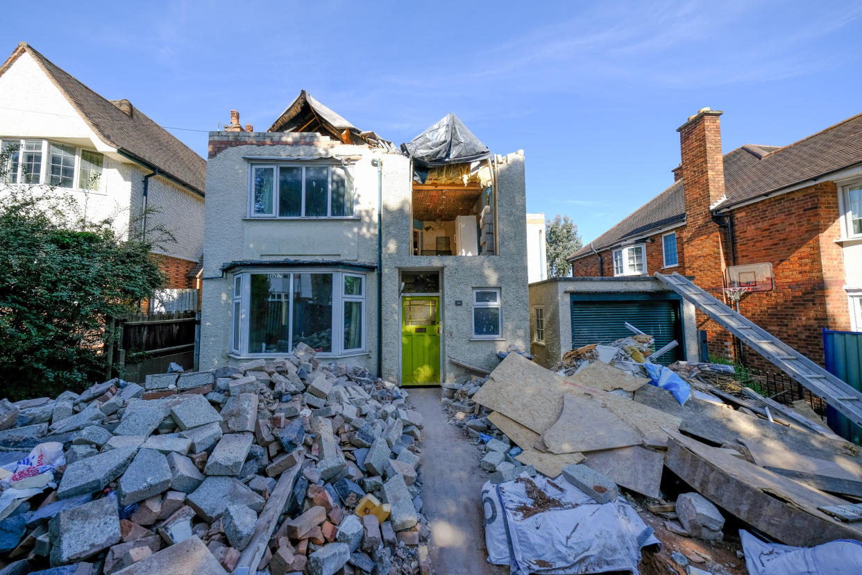 GV of the detached property on Guilford Road in Stoneygate, Leicester, which has been left with its roof missing and rubble scattered all around it after a builder decided to undo the work he'd done following a row about cash.  June 8, 2021.  See SWNS story SWMDhouse.  Properties on the pleasant tree-lined avenue average at more than Â£540,000. 