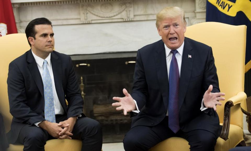 Donald Trump speaks with Governor Ricardo Rosselló of Puerto Rico during a meeting in the Oval Office at the White House on Thursday.