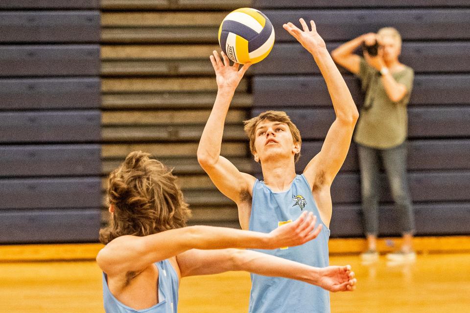 Cape Henlopen High School junior Talan Stephens (7) sets a ball against Salesianum School during the boys volleyball game at Salesianum in Wilmington, Friday, April 14, 2023. Salesianum won 3-0.