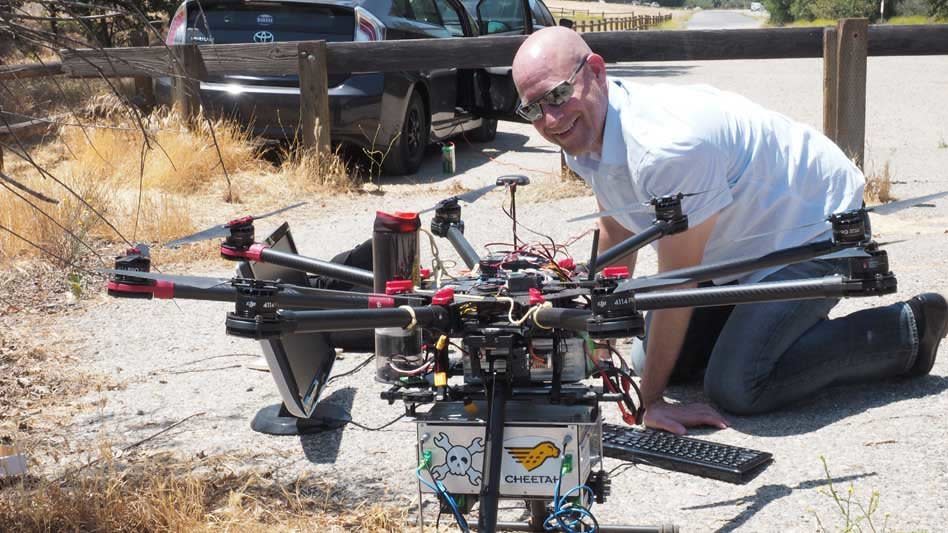 Joseph Demers of Bakman Technologies with a drone-mounted spectrometer he's developing. The government shutdown has disrupted his research.