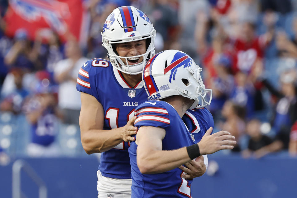 Buffalo Bills punter Matt Araiza, left, celebrates with place-kicker Tyler Bass, right, after Bass kicked the go-ahead field goal in the second half of a preseason NFL football game against the Indianapolis Colts on Saturday, Aug. 13, 2022, in Orchard Park, N.Y. The Bills won 27-24. (AP Photo/Jeffrey T. Barnes)