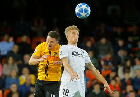 Soccer Football - Champions League - Group Stage - Group H - Valencia v Young Boys - Mestalla, Valencia, Spain - November 7, 2018 Valencia's Daniel Wass in action with Young Boys' Christian Fassnacht REUTERS/Heino Kalis