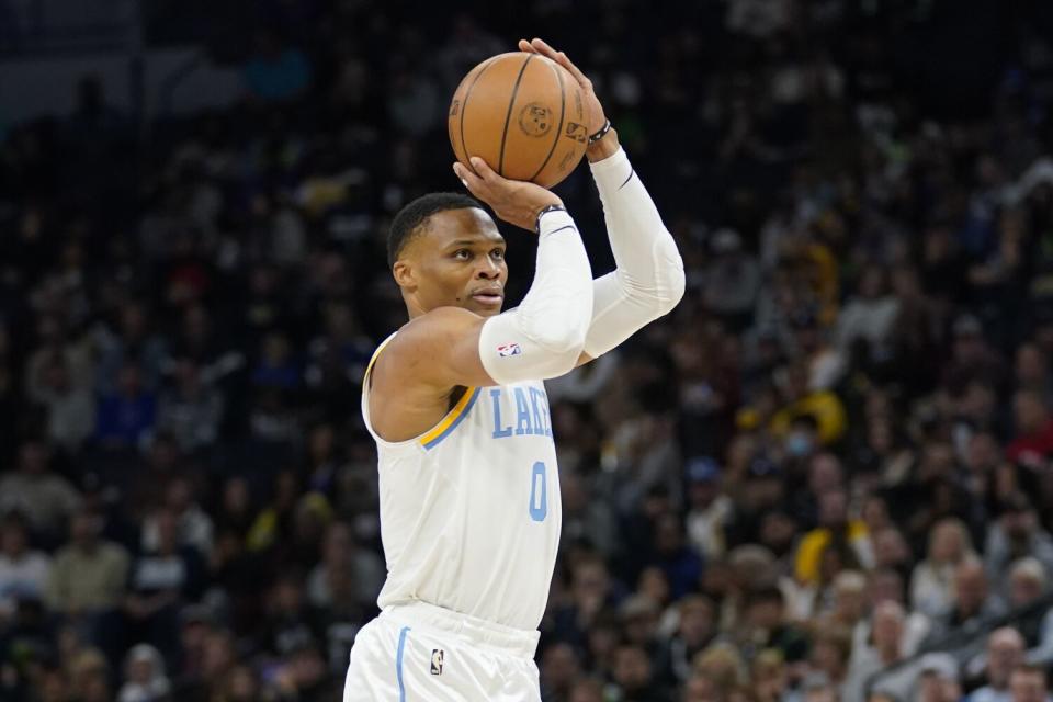 Lakers guard Russell Westbrook shoots during Friday's loss to the Timberwolves.