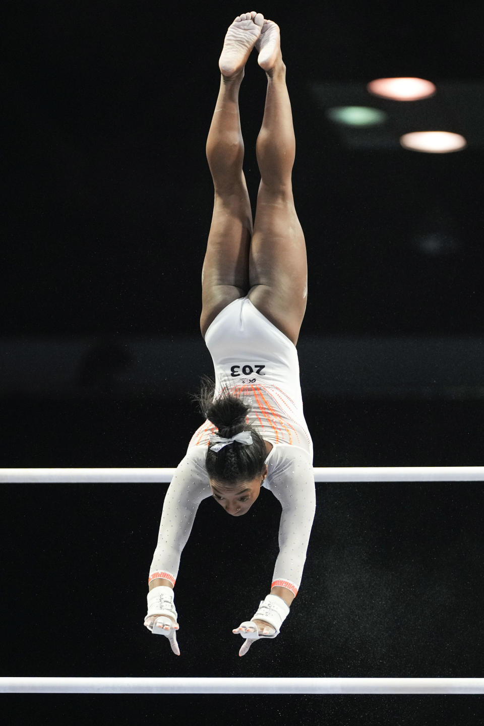 Simone Biles performs her routine on the uneven bars during the U.S. Classic gymnastics competition in Indianapolis, Saturday, May 22, 2021. (AP Photo/AJ Mast)