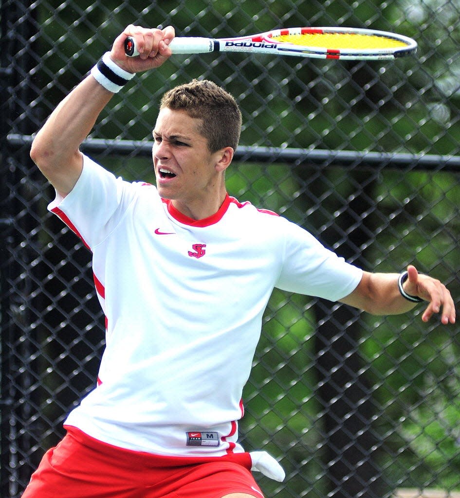 Former St. John's state champion Chris Ellis is helping coach the Pioneers this season.