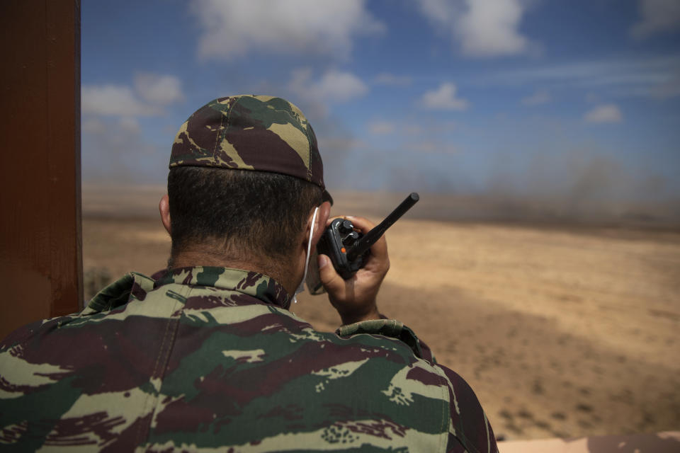 A Moroccan soldier takes part in the African Lion military exercise, in Tantan, south of Agadir, Morocco, Friday, June 18, 2021. The U.S.-led African Lion war games, which lasted nearly two weeks, stretched across Morocco, a key U.S, ally, with smaller exercises held in Tunisia and in Senegal, whose troops ultimately moved to Morocco. (AP Photo/Mosa'ab Elshamy)