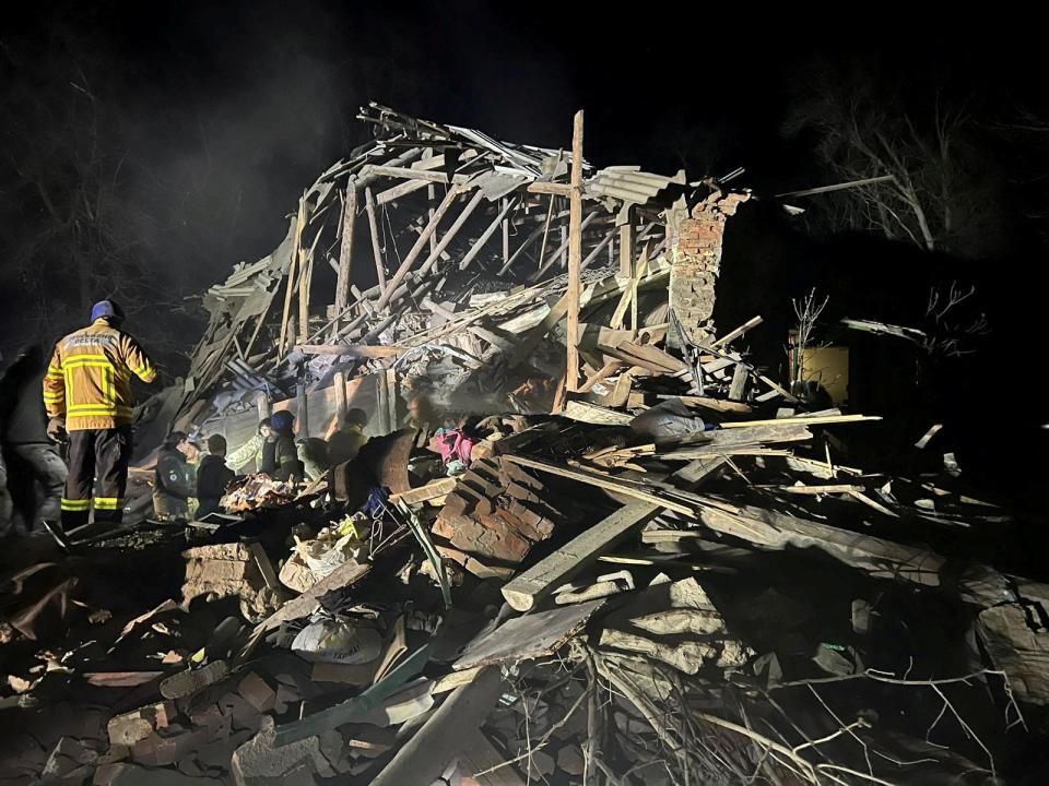 Rescuers work at a site of a strike in Kostiantynivka this morning (State Emergency Service of Ukraine/Reuters)