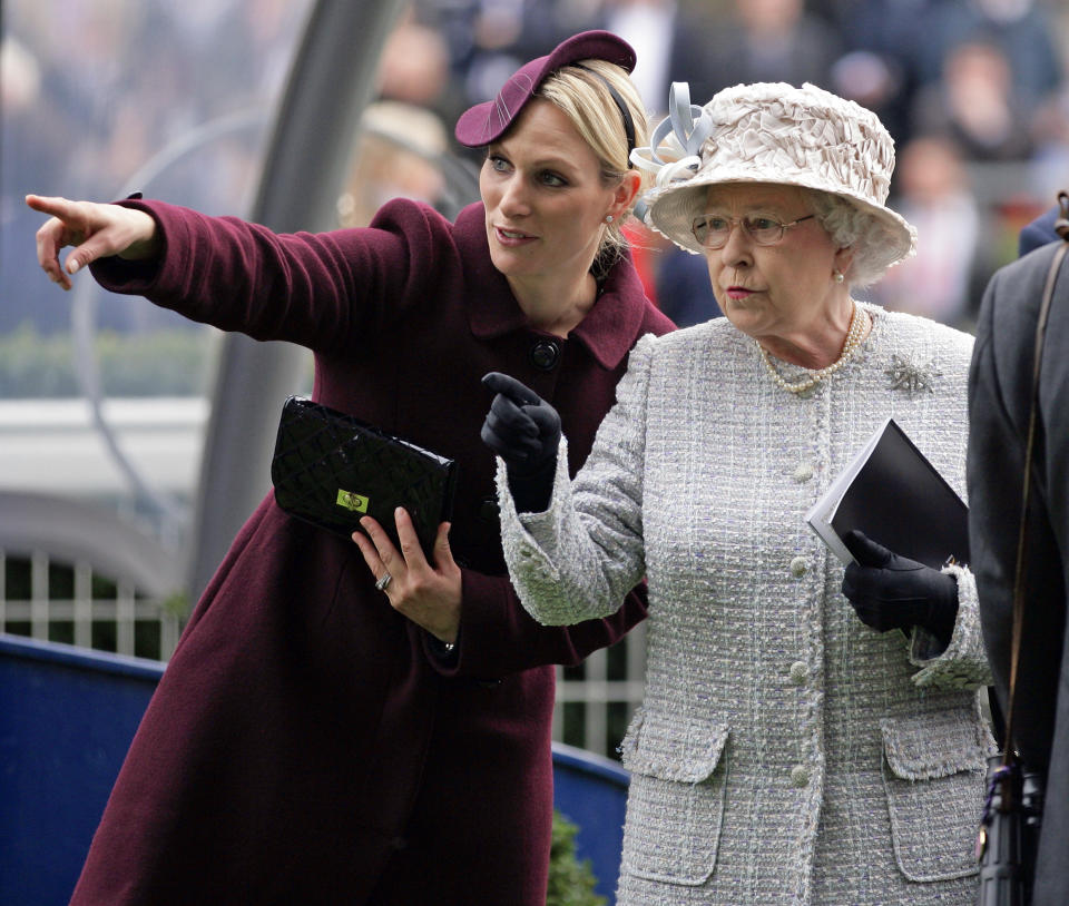 Zara Phillips and Queen Elizabeth II attend the QIPCO British Champions Day meet at Ascot Racecourse on October 20, 2012 in Ascot, England.