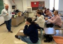 Kirby Hasseman of Hasseman Marketing and Communications speaks to students of the entrepreneur club at Coshocton High School on his business and work with the Coshocton County Chamber of Commerce.