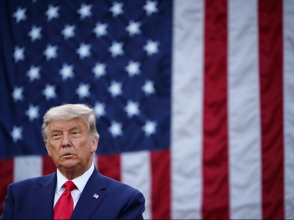 US President Donald Trump looks on after delivering an update on ‘Operation Warp Speed’ in the Rose Garden of the White House in Washington, DC (AFP via Getty Images)