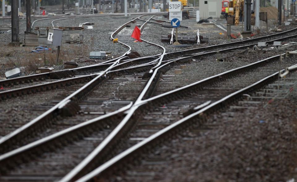 A red flag blocks the tracks at the main train station in Ghent, western Belgium, Wednesday, Oct. 3, 2012. A 24-hour strike by Belgian rail workers on Wednesday paralyzed train traffic throughout Belgium and the international high-speed service to London and Paris. The strike, which started late Tuesday, reached its peak during the Wednesday morning rush hour when tens of thousands of commuters had to take to traffic-choked highways to get into the capital or work. (AP Photo/Yves Logghe)