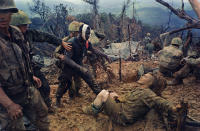 <p>“Reaching out,” Mutter Ridge, Nui Cay Tri, Operation Prairie, Oct. 5, 1966. (Photograph by Larry Burrows) </p>