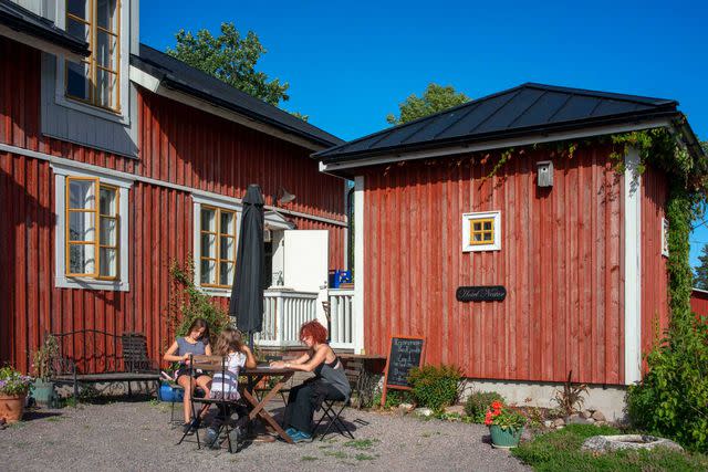 <p>Sergi Reboredo/VWPics/Redux</p> The entrance to the Hotel Nestor, a rustic inn on Korpo, an island in the Turku Archipelago.