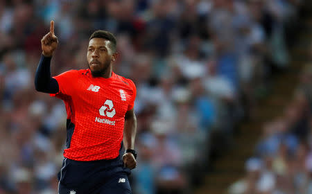 FILE PHOTO - Cricket - England v Australia - International T20 - Edgbaston Cricket Ground, Birmingham, Britain - June 27, 2018 England’s Chris Jordan celebrates taking the wicket of Australia's Ashton Agar Action Images via Reuters/Andrew Boyers