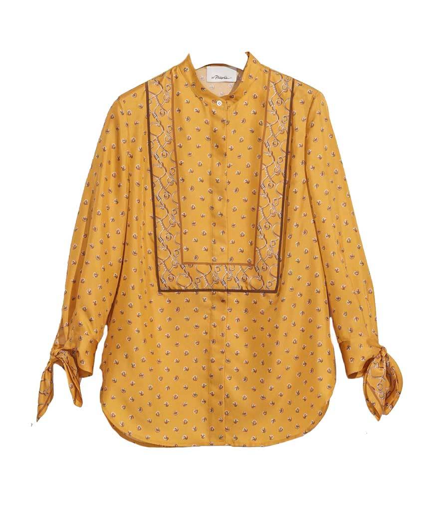 <p>Printed Tie-Sleeve Blouse, $525, <a href="https://www.31philliplim.com/shop/scarf-print-blouse-with-tied-sleeves-2455.html" rel="nofollow noopener" target="_blank" data-ylk="slk:31philliplim.com;elm:context_link;itc:0;sec:content-canvas" class="link ">31philliplim.com</a></p>