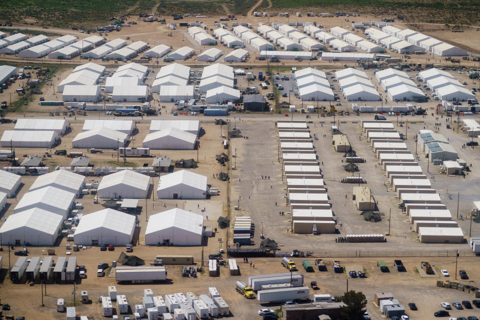 Tents are set up at Fort Bliss' Doña Ana Village, in New Mexico, where Afghan refugees are being housed, Friday, Sept. 10, 2021. The Biden administration provided the first public look inside the U.S. military base where Afghans airlifted out of Afghanistan are screened, amid questions about how the government is caring for the refugees and vetting them. (AP Photo/David Goldman)