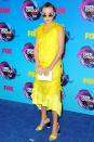 <p>The 13-year-old actress seriously upped her fashion game in a vibrant yellow dress by Kenzo.<br><i>[Photo: Getty]</i> </p>