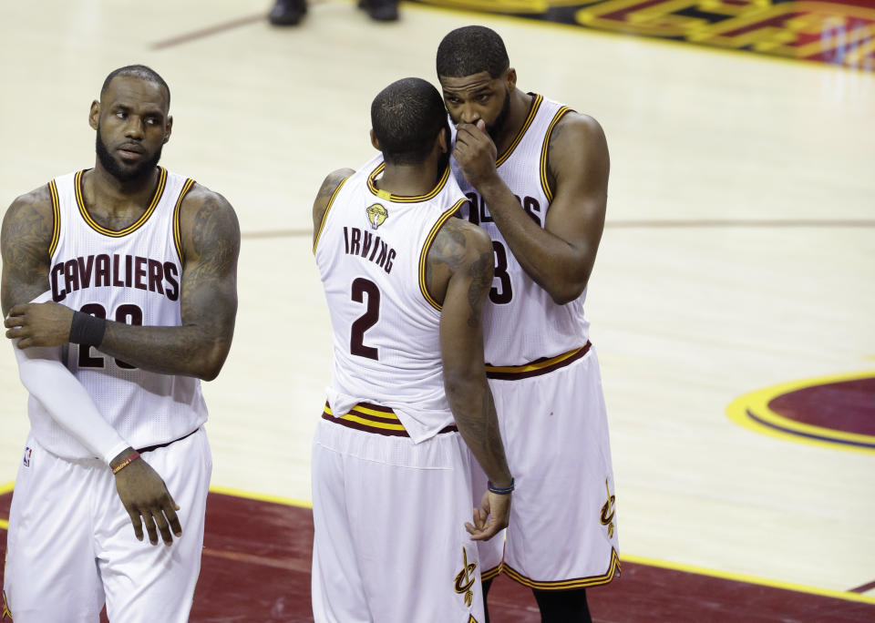 Apparently Kyrie Irving *did* speak to teammates during games. (AP)