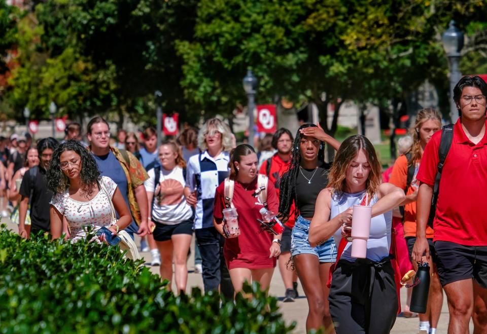 Students walk on the University of Oklahoma campus. On Wednesday, OU President Joseph Harroz sent a letter to students to address the news that Gov. Kevin Stitt had signed an order that prohibited funds and resources from being directed toward higher education programs of diversity, equity and inclusion.