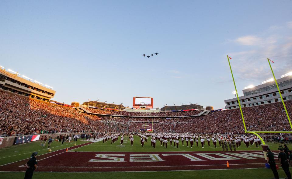 Fans pack Doak Campbell Stadium in anticipation for the first game of the season as the Marching Chiefs perform before kickoff Sunday, Sept. 5, 2021.