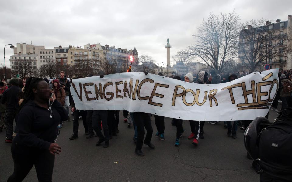 French youths clash with officers and blockade schools in protest over alleged police rape of black youth