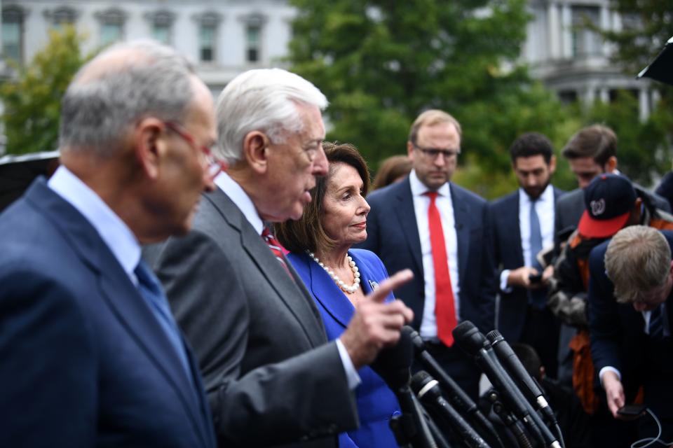 Speaker of the House Nancy Pelosi (R), Senate Minority Leader Chuck Schumer (D-NY) (C) and Representative Steny Hoyer, speak with the media after meeting with US President Donald Trump at the White House in Washington on Oct. 16, 2019. (Photo: Brendan Smialowski/AFP via Getty Images)