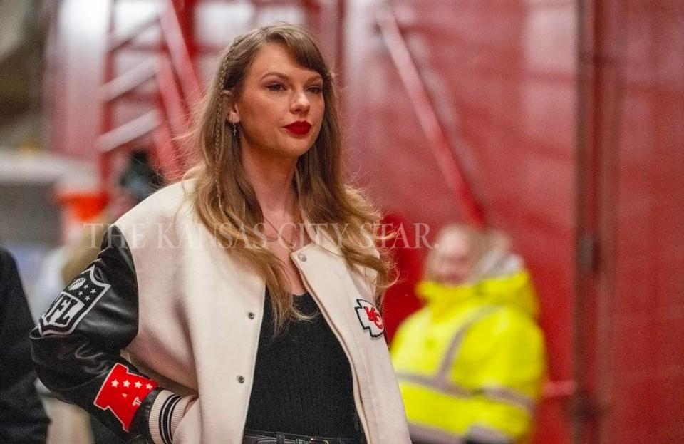 One of Taylor Swift’s cold weather game-day outfits: A varsity jacket similar to one worn by her boyfriend, Kansas City Chiefs tight end Travis Kelce.