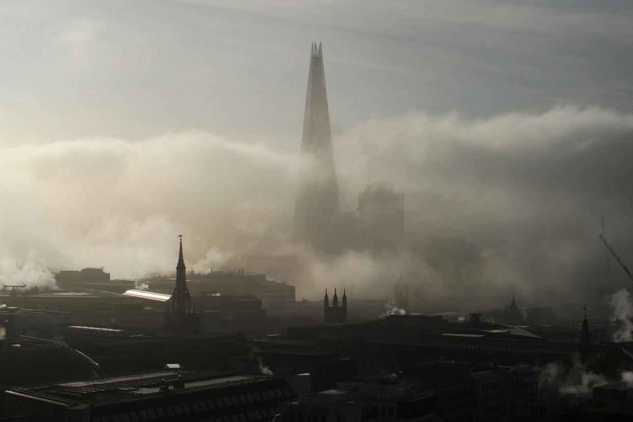 The Shard rises out of low fog in the morning in London on February 22: AFP/Getty Images