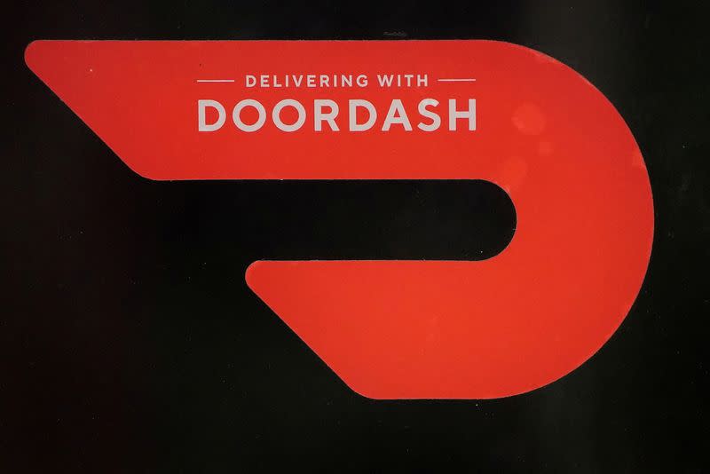 FILE PHOTO: A DoorDash sign is pictured on a restaurant on the day they hold their IPO