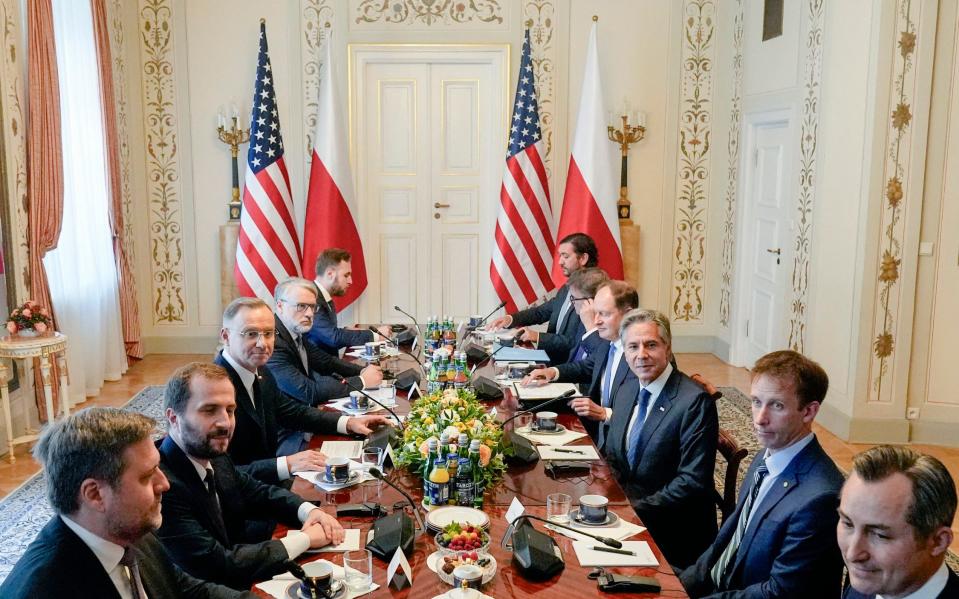 Polish president Andrzej Duda (third from left) and Antony Blinken attend a meeting in Warsaw