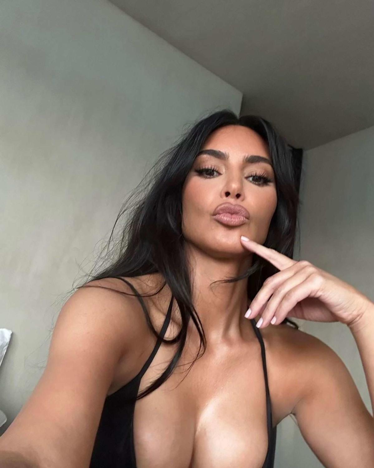 Kim Kardashian Honeymoon Porn - Apparently, Kim Kardashian Lounges Around the House in a String Bikini