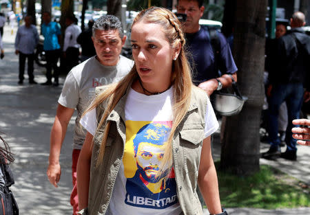 Lilian Tintori, wife of jailed opposition leader Leopoldo Lopez, arrives to a meeting of the Venezuelan coalition of opposition parties (MUD) in Caracas, Venezuela July 3, 2017. REUTERS/Marco Bello