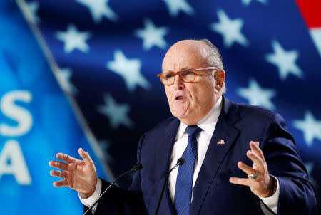 FILE PHOTO: Rudy Giuliani, former Mayor of New York City, delivers his speech as he attends the National Council of Resistance of Iran (NCRI), meeting in Villepinte, near Paris, France, June 30, 2018. REUTERS/Regis Duvignau